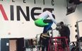 Video: College footballer performs 40-inch box jump while holding two 32kg dumbbells
