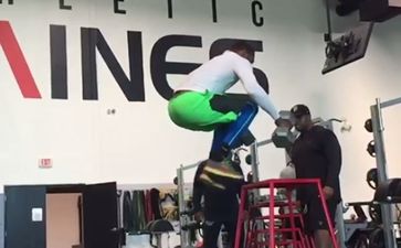 Video: College footballer performs 40-inch box jump while holding two 32kg dumbbells