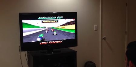 Video: Man plays Mario Kart while live band perform the soundtrack in the background
