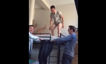 Video: Kilkenny man on Edinburgh stag tries to leap off bunkbed into a pair of trousers held by two mates