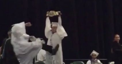 Vine: A guy hits his friend with a Stone Cold Stunner on stage at their graduation