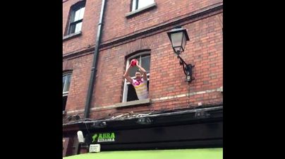 Video: Scottish fan goes to great lengths to get his ball back in Dublin