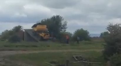 Video: An efficient, if highly dangerous-looking method of loading turf in a bog in Galway