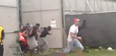 Video: Concert goers smash their way into the Wireless festival and run from security