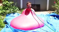 Video: Six foot man in six foot waterballoon recorded in super slo-mo is all you’d want it to be