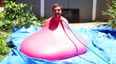 Video: Six foot man in six foot waterballoon recorded in super slo-mo is all you’d want it to be