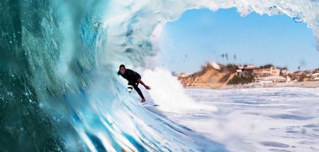 Video: Amazing footage of a surfer on fire as he catches a wave