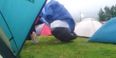 Video: Irish lad tries to save his tent at music festival as storm starts blowing it away
