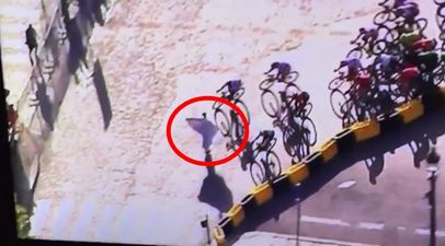 Video: Protester tries to take down riders in the closing stages of the Tour de France today