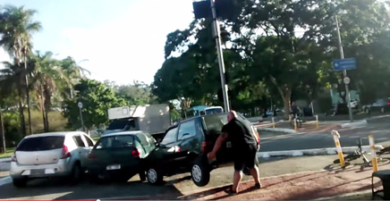 Video: Beast of a cyclist clears car from cycle-lane using just his bare hands