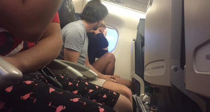 PIC: Woman live tweets a guy breaking up with his girlfriend on a plane and it’s hilarious