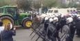 VIDEO: A water cannon completely blowing away a tractor at a protest