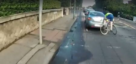 VIDEO: A cyclist in Dublin rams into the back of a car and leaves massive dent