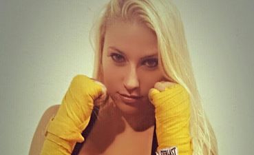 PICS: MMA fighter reportedly forced to fight in heavier division because of the size of her breasts