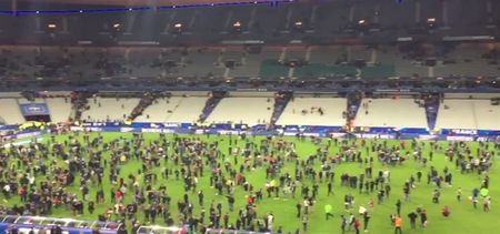 VIDEO: Explosion heard during France v Germany match at Stade de France, terrified fans gather on the pitch