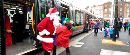 VIDEO: Santa and one of his elves dancing on the Luas makes for very well-meaning Christmas cringe
