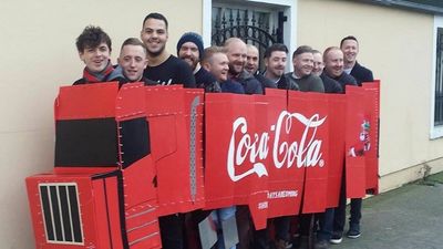 PIC: The guys that dressed up as the Coca-Cola truck for the 12 pubs are having the craic around Dublin