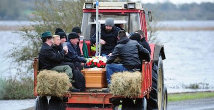 PICS: Flooded Longford mourners forced to carry coffin to cemetery in a tractor