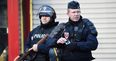Man armed with knife shot dead at Paris police station on Charlie Hebdo anniversary