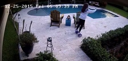 VIDEO: Girl falling off her hoverboard in spectacular fashion next to a swimming pool is pure gold
