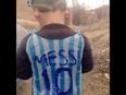 TWEETS: A campaign to identify a child wearing a plastic bag as a Lionel Messi jersey has gone viral