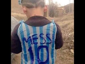 TWEETS: A campaign to identify a child wearing a plastic bag as a Lionel Messi jersey has gone viral