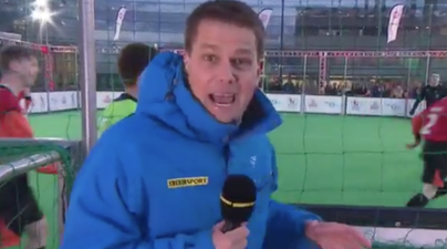 VIDEO: BBC presenter gets hit with a football live on air, responds like a boss