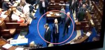 VIDEO: Was this TD waving at someone or suggesting going for pints in the Dail yesterday?