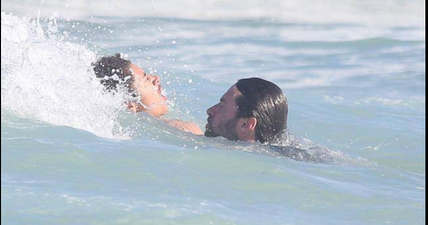 PICS: Hugh Jackman rescues swimmers from rough waters on popular tourist beach