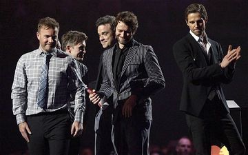 REPORTS: Robbie Williams set to rejoin Take That for anniversary tour