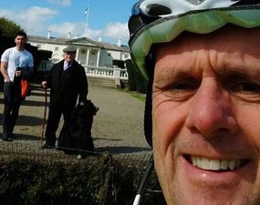 PIC: President Michael D. Higgins just loves photobombing people in the Phoenix Park