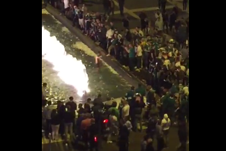 VIDEO: Crowd gathers to watch Ireland fan take his clothes off and dance in a fountain