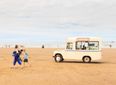 PIC: Ice-cream van on a Derry beach forgets about the tide coming in…