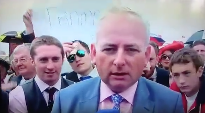 WATCH: Punter at the Galway Races cools off by rubbing €50 note over himself
