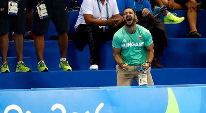 WATCH: Husband goes absolutely cracked cheering on Olympic swimmer
