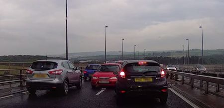 WATCH: Startling footage of a car driving against traffic on a dual carriageway in Derry