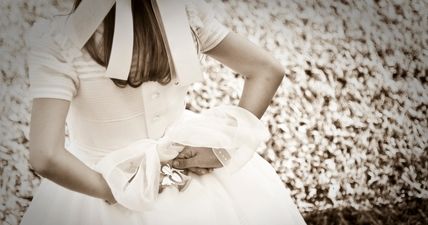 PIC: Young fella has no Halloween costume, so trolls his sister by wearing her communion dress