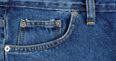 Here’s why you have that tiny button on your jeans