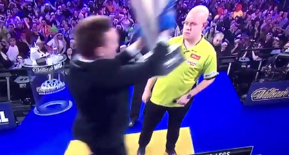 WATCH: Fan causes havoc as he invades stage during World Darts final