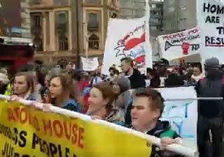 Apollo House activists march to the Department of Finance