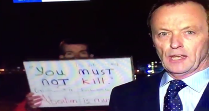 WATCH: RTÉ correspondent demonstrates the perfect way deal with an annoying interruption