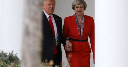 Bizarre explanation emerges for why Donald Trump and Theresa May were seen holding hands