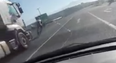 WATCH: Cyclist lucky to be alive after this hair-raising near collision with a lorry