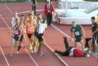 WATCH: Official wanders into the track and collides with 1500m race runners