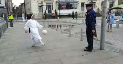 WATCH: Nothing to see here, just a Garda and a nun playing keepy-uppies in Limerick city