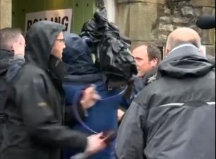 WATCH: Cameramen get into “proper scrap” in effort to get the best shots at UK polling station