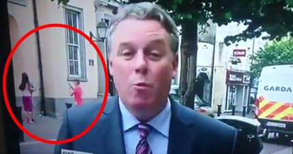 WATCH: Teenagers caught getting a picture of themselves shifting in the background of RTÉ News report