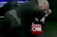 WATCH: Donald Trump shares a video of him tackling “CNN” and beating it up