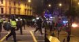 Fireworks and bottles thrown at riot police at East London death protest