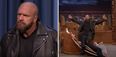 Jimmy Fallon getting smashed through his desk by Triple H is exactly what you need to see right now